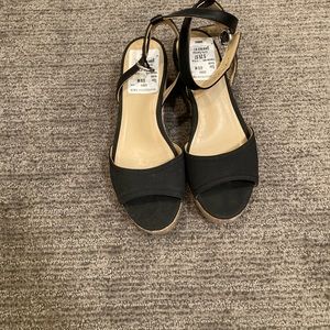 Black and tan espadrilles